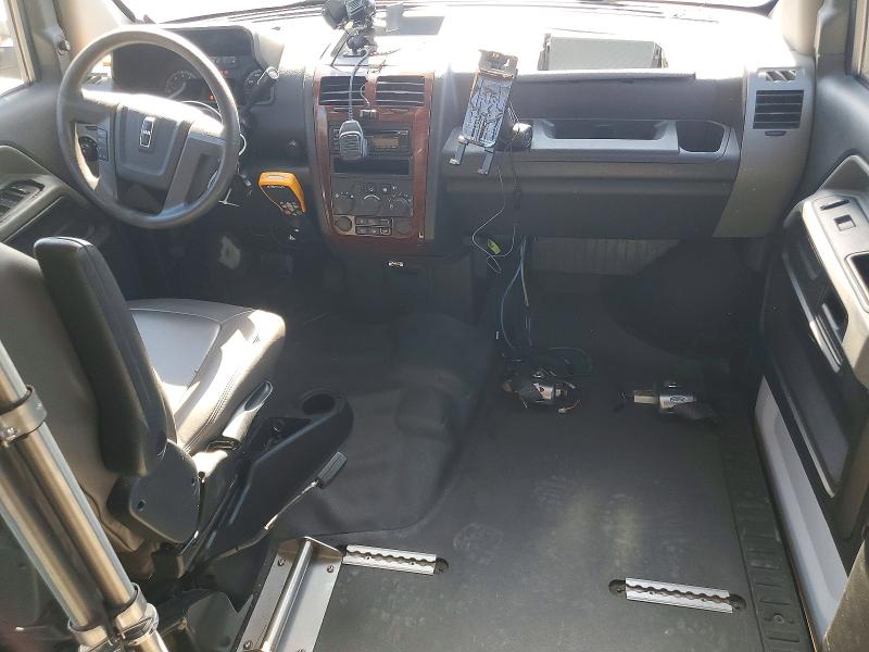 2014 Am general Mv-1 VIN 57WMD2A68EM101805 COPART salvage auction — MINOR DENT/SCRATCHES, NC - CERTIFICATE OF TITLE, sold $1,100 on 2026-07-06 (photo 8)