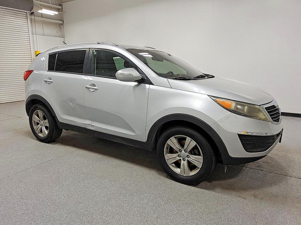 2012 Kia Sportage VIN KNDPB3A23C7247339 COPART salvage auction — NORMAL WEAR, WV - CERTIFICATE OF TITLE, sold $1,300 on 2026-07-16 (photo 4)