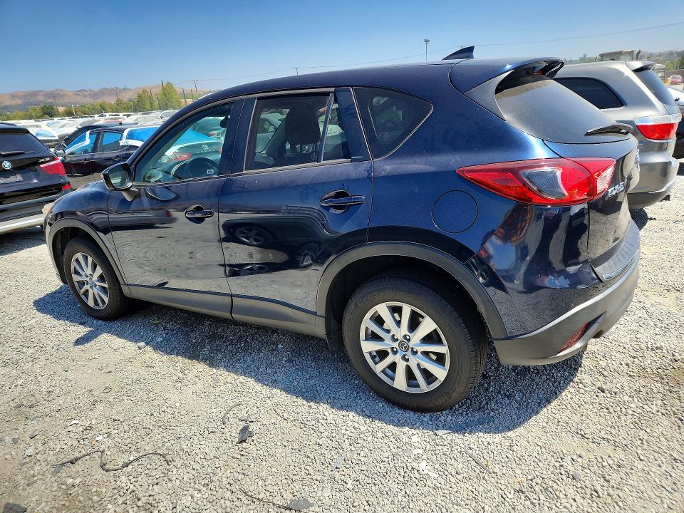 2016 Mazda VIN JM3KE2CY0G0834990 COPART salvage auction — SIDE, Ca - Salvage Certificate, sold $2,950 on 2026-07-15 (photo 2)