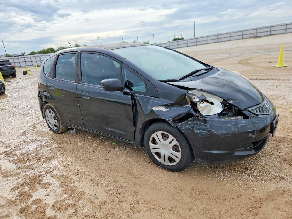 2011 Honda Fit VIN JHMGE8H34BC027411 COPART salvage auction — SIDE, Tx - Salvage Vehicle Title, sold $900 on 2026-07-30 (photo 4)