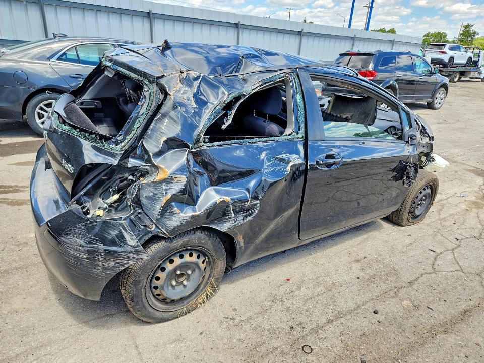 2009 Toyota Yaris VIN JTDJT903295233856 COPART salvage auction — ALL OVER, IN - CERT OF TITLE-SALVAGE TITLE (P), sold $225 on 2026-07-27 (photo 3)