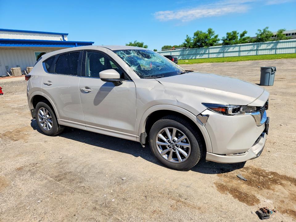 2025 Mazda VIN JM3KFBBL5S0710175 COPART salvage auction — HAIL, Salvage Title, sold $6,100 on 2026-07-14 (photo 4)