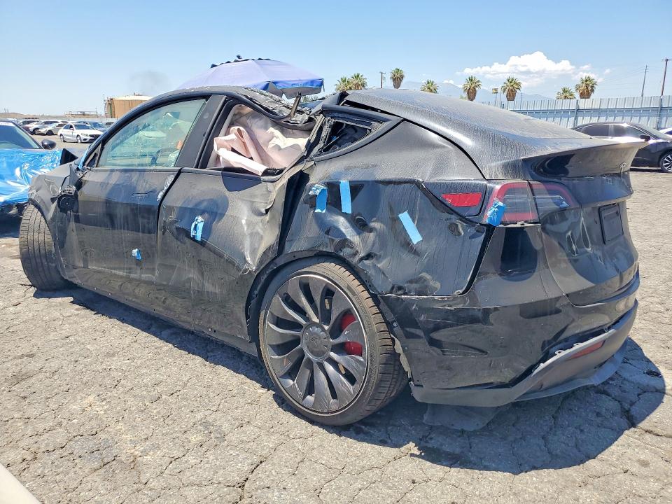 2023 Tesla Model y VIN 7SAYGDEF1PF859745 COPART salvage auction — ALL OVER, CA - SALVAGE CERTIFICATE, sold $1,650 on 2026-07-20 (photo 2)
