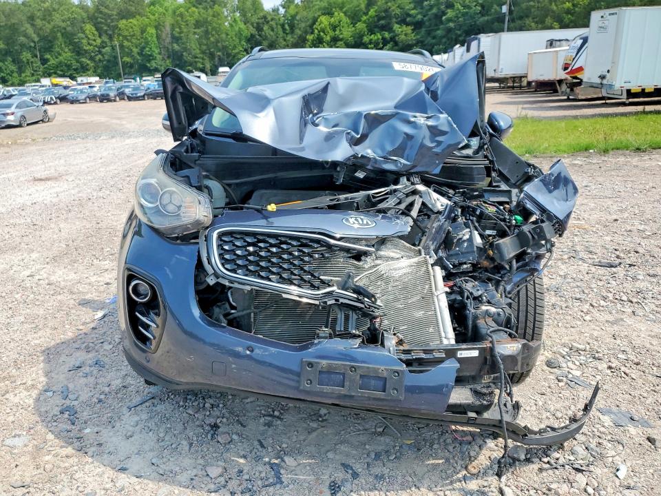 2018 Kia Sportage VIN KNDPNCAC5J7309935 COPART salvage auction — ALL OVER, VA - CERT OF TITLE - SALVAGE, sold $525 on 2026-07-20 (photo 5)