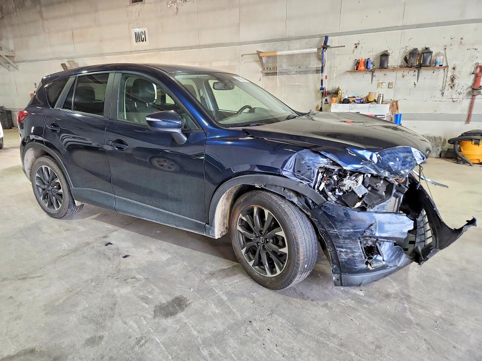 2016 Mazda VIN JM3KE4DY0G0692909 COPART salvage auction — FRONT END, Mi - Certificate Of Title, sold $1,550 on 2026-07-10 (photo 4)