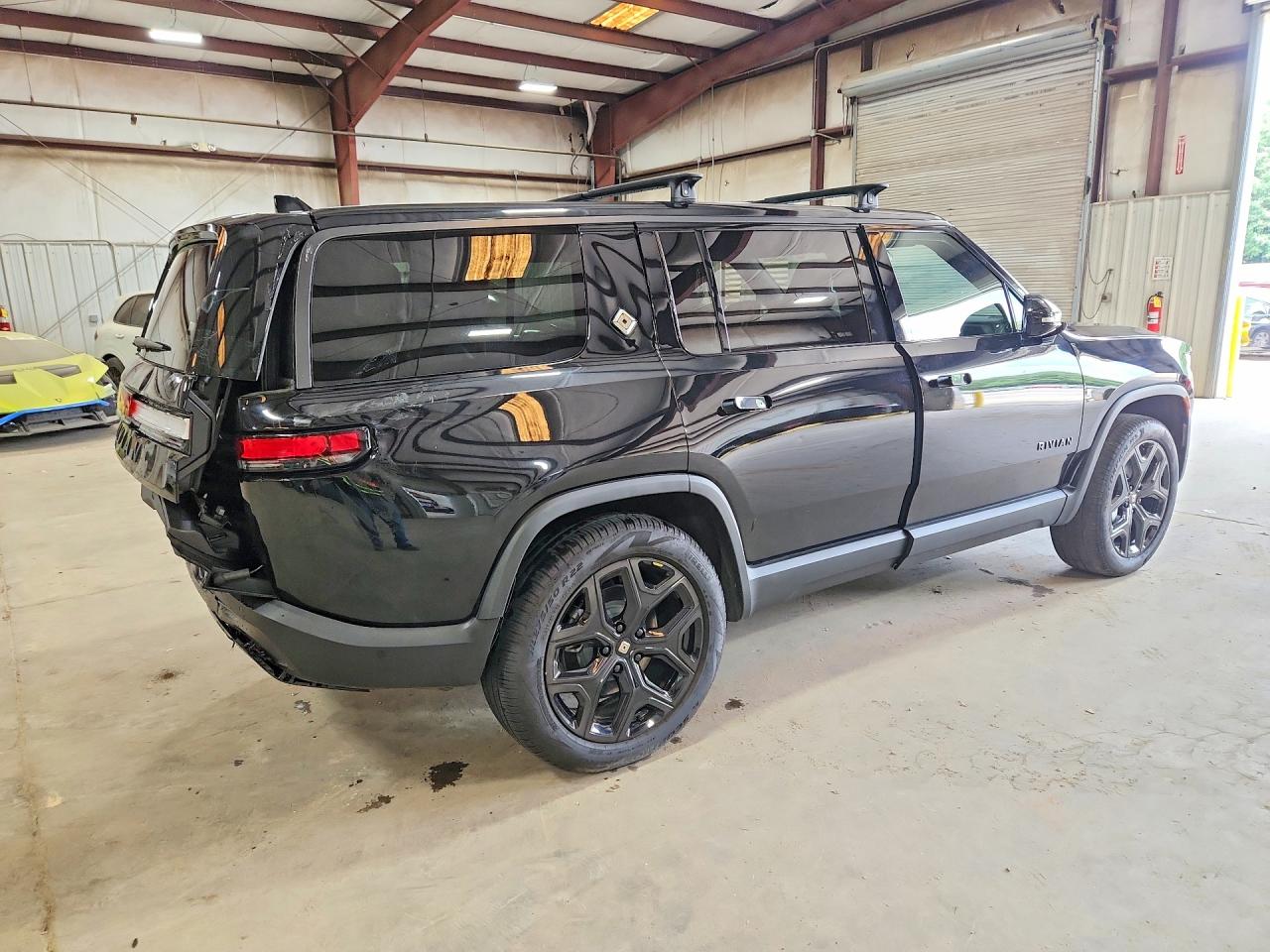 2025 Rivian R1S VIN 7PDSGBBA7SN059096 COPART salvage auction — Rear End, GA - CERT OF TITLE-SALVAGE, sold $31,500 on 2026-07-02 (photo 3)