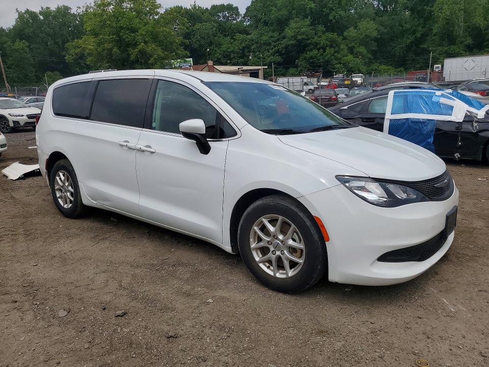 2023 Chrysler Voyager VIN 2C4RC1CG4PR601036 COPART salvage auction — MINOR DENT/SCRATCHES, Fl - Cert Of Title Slvg Rebuildable, sold $12,200 on 2026-07-28 (photo 4)