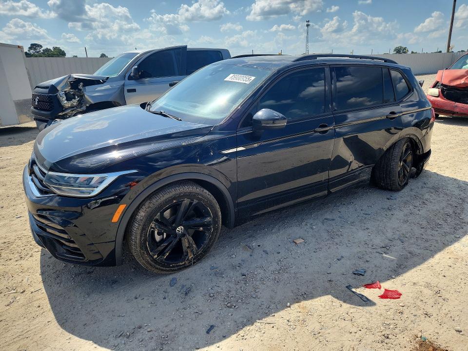 2023 Volkswagen Tiguan VIN 3VVCB7AX2PM075951 COPART salvage auction — SIDE, Salvage Title, sold $8,300 on 2026-08-27 (photo 1)
