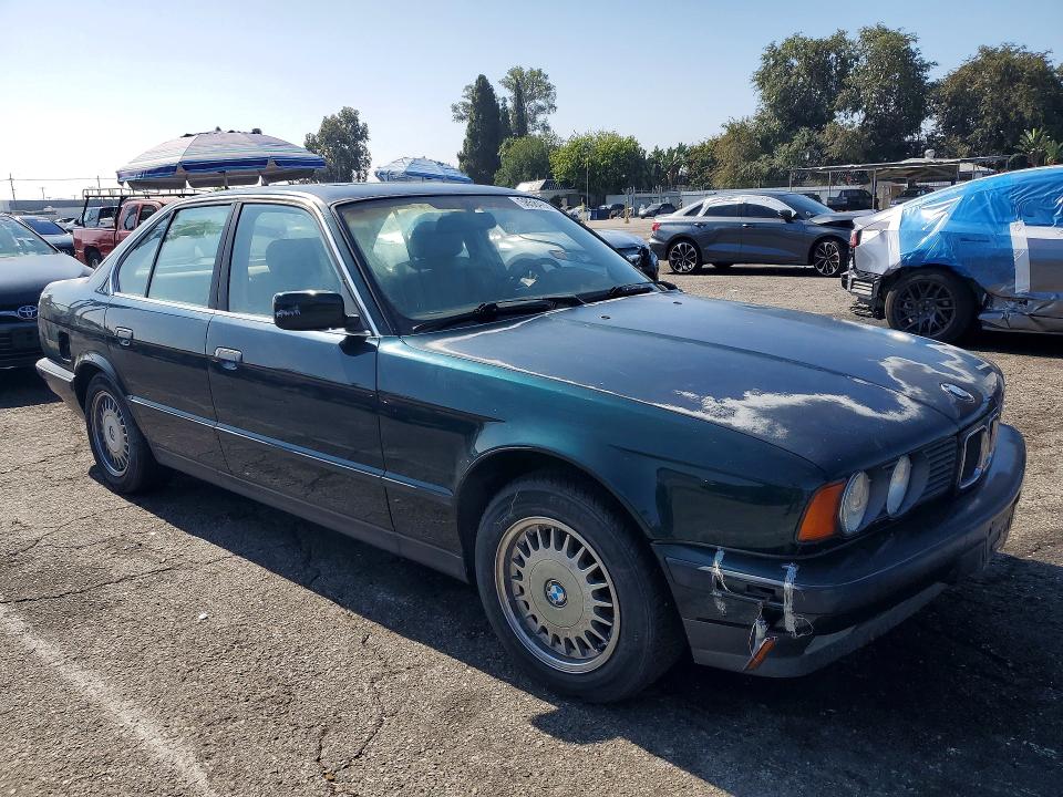 1994 BMW 5 series VIN WBAHD6320RGK43798 COPART salvage auction — NORMAL WEAR, CA - DIS/DLR/EXP ONLY CLEAN TITLE, sold $525 on 2026-07-30 (photo 4)