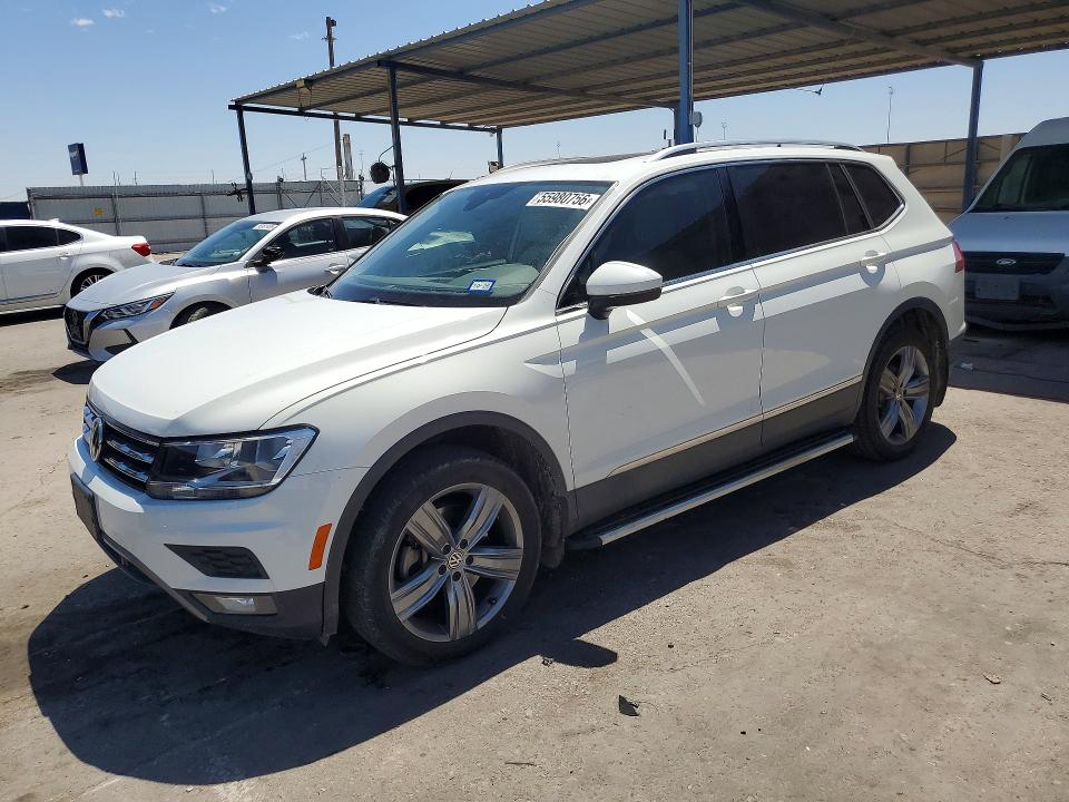 2020 Volkswagen Tiguan VIN 3VV3B7AX7LM130839 COPART salvage auction — REAR END, TX - SALVAGE VEHICLE TITLE (P), sold $6,900 on 2026-08-14 (photo 1)