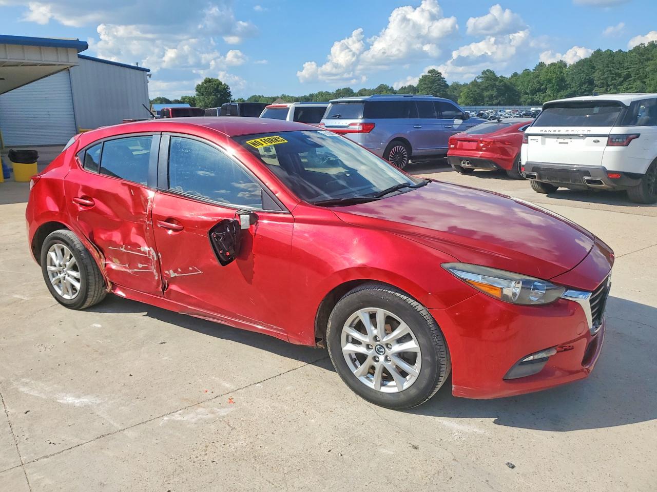 2018 Mazda 3 VIN 3MZBN1K70JM186483 COPART salvage auction — Side, MS - CERTIFICATE OF TITLE, sold $2,000 on 2026-07-09 (photo 4)