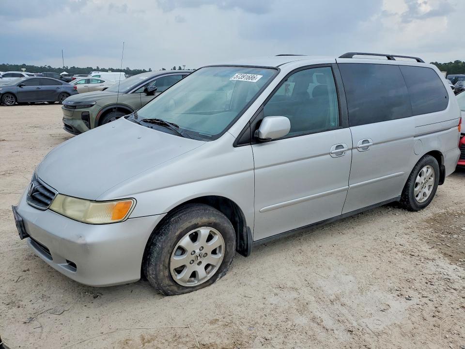 2002 Honda Odyssey VIN 2HKRL18032H514861 — COPART salvage auction photo