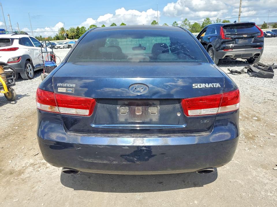 2006 Hyundai Sonata VIN 5NPEU46FX6H043379 COPART salvage auction — SIDE, Fl - Cert Of Title Slvg Rebuildable, sold $475 on 2026-07-07 (photo 6)
