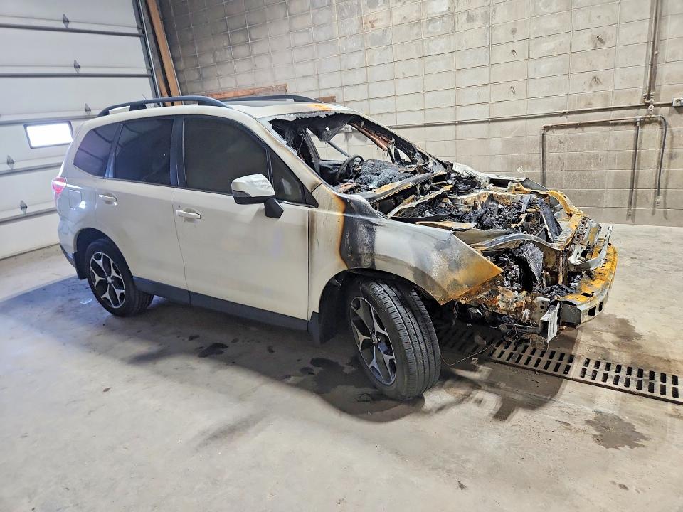 2014 Subaru Forester VIN JF2SJGMC7EH404572 COPART salvage auction — Burn Engine, MN - CERT OF TITLE-PRIOR SALVAGE, sold $500 on 2026-07-07 (photo 4)