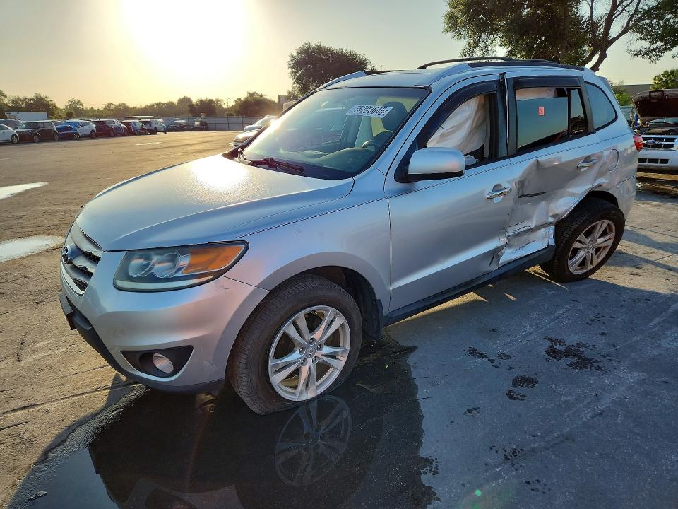 2012 Hyundai Santa fe VIN 5XYZK3ABXCG128084 COPART salvage auction — SIDE, Fl - Cert Of Title Slvg Rebuildable, sold $1,150 on 2026-07-16 (photo 1)