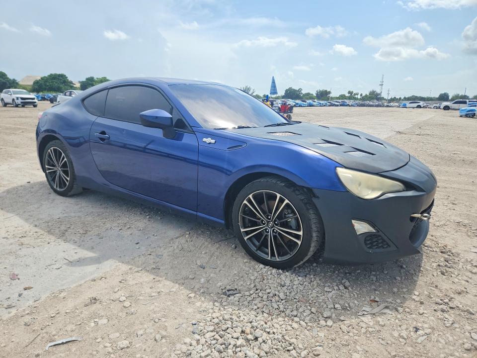 2013 Scion VIN JF1ZNAA15D2732260 COPART salvage auction — ROOF, Fl - Certificate Of Title, sold $2,500 on 2026-07-09 (photo 4)