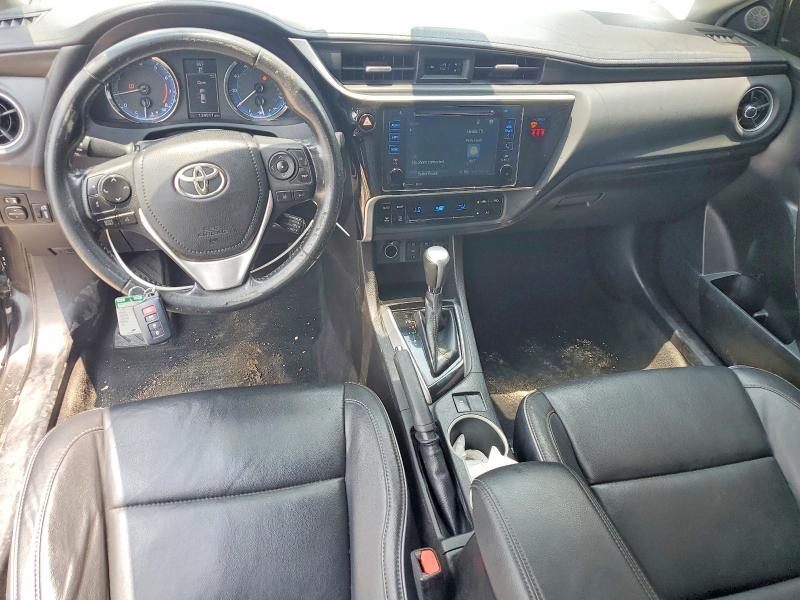 2018 Toyota Corolla VIN 5YFBURHE3JP840962 COPART salvage auction — SIDE, Tx - Salvage Vehicle Title, sold $2,450 on 2026-07-27 (photo 8)