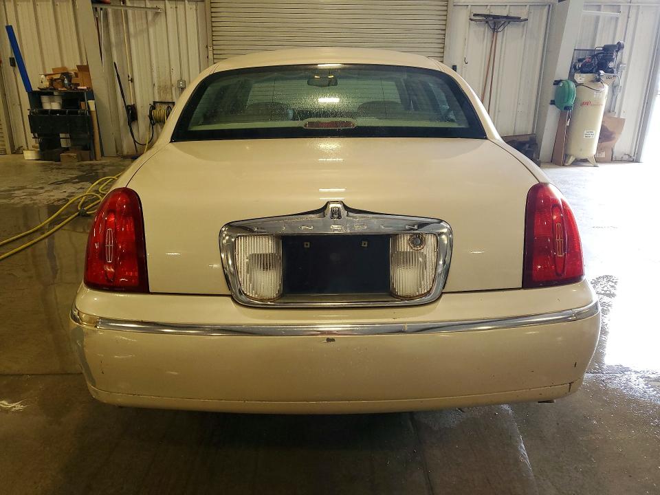 2001 Lincoln TOWN CAR VIN 1LNHM83W71Y701168 COPART salvage auction — FRONT END, MN - CERT OF TITLE-PRIOR SALVAGE, sold $70 on 2026-07-27 (photo 6)
