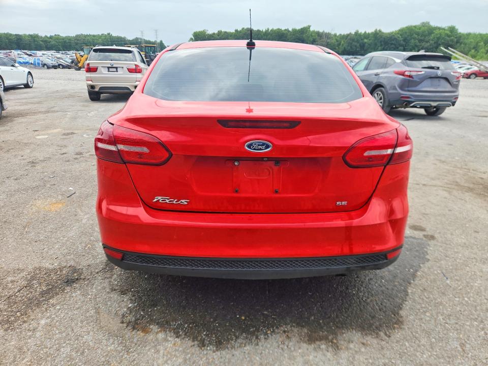 2015 Ford Focus VIN 1FADP3F21FL271153 COPART salvage auction — NORMAL WEAR, Tn - Salvage Certificate, sold $1,050 on 2026-07-02 (photo 6)