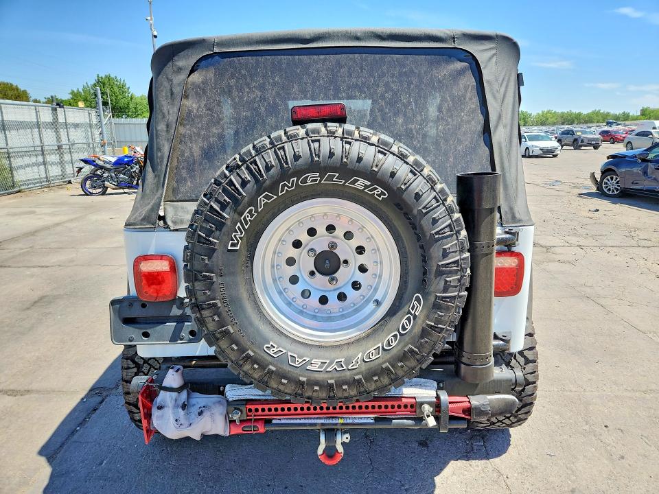 2004 Jeep Wrangler / VIN 1J4FA39S94P700586 COPART salvage auction — NORMAL WEAR, Co - Cert Of Title-Rebuilt Salvage, sold $4,000 on 2026-07-08 (photo 6)
