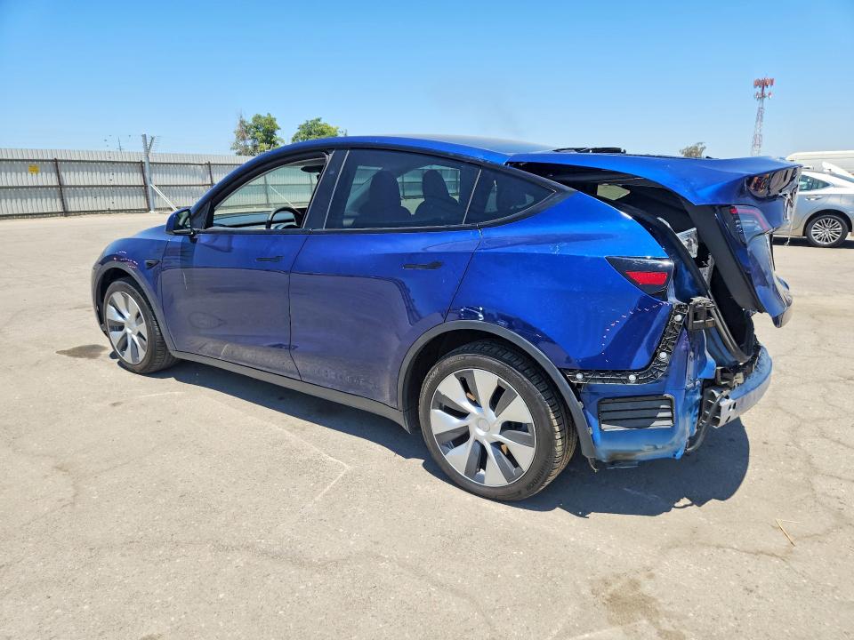 2023 Tesla Model y VIN 7SAYGAEE0PF836964 COPART salvage auction — REAR END, CA - SALVAGE CERTIFICATE, sold $9,800 on 2026-07-24 (photo 2)