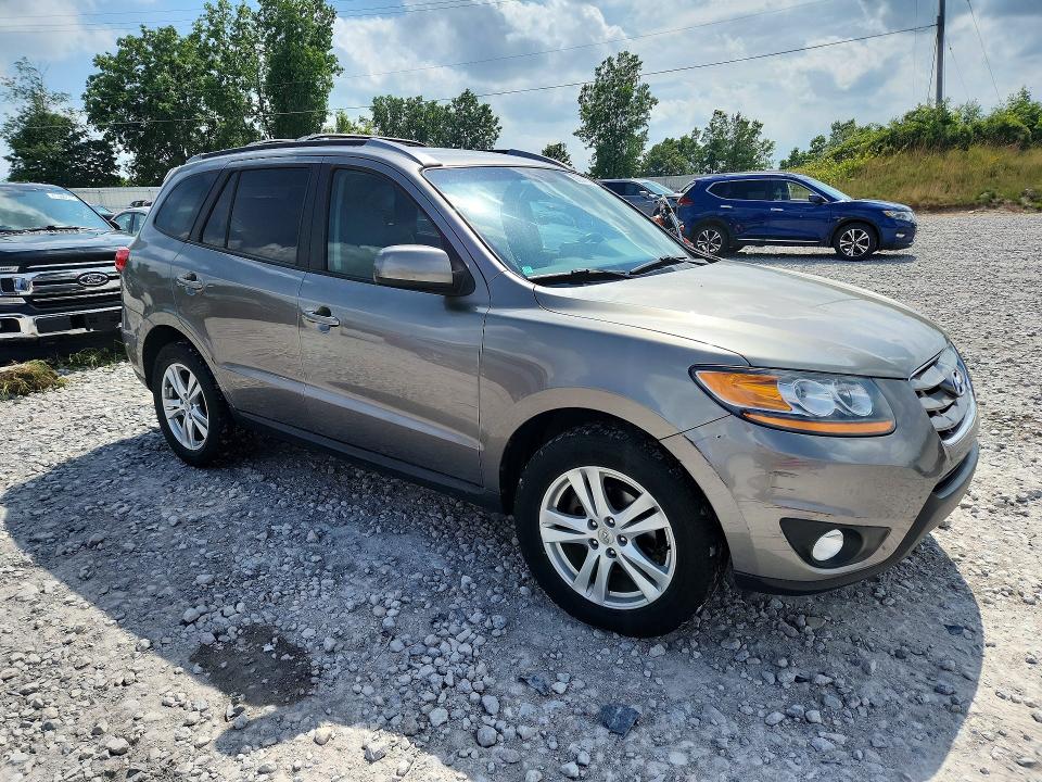 2011 Hyundai Santa fe VIN 5XYZH4AG9BG005052 COPART salvage auction — NORMAL WEAR, MI - DEALER ONLY CLEAN TITLE, sold $1,150 on 2026-07-09 (photo 4)