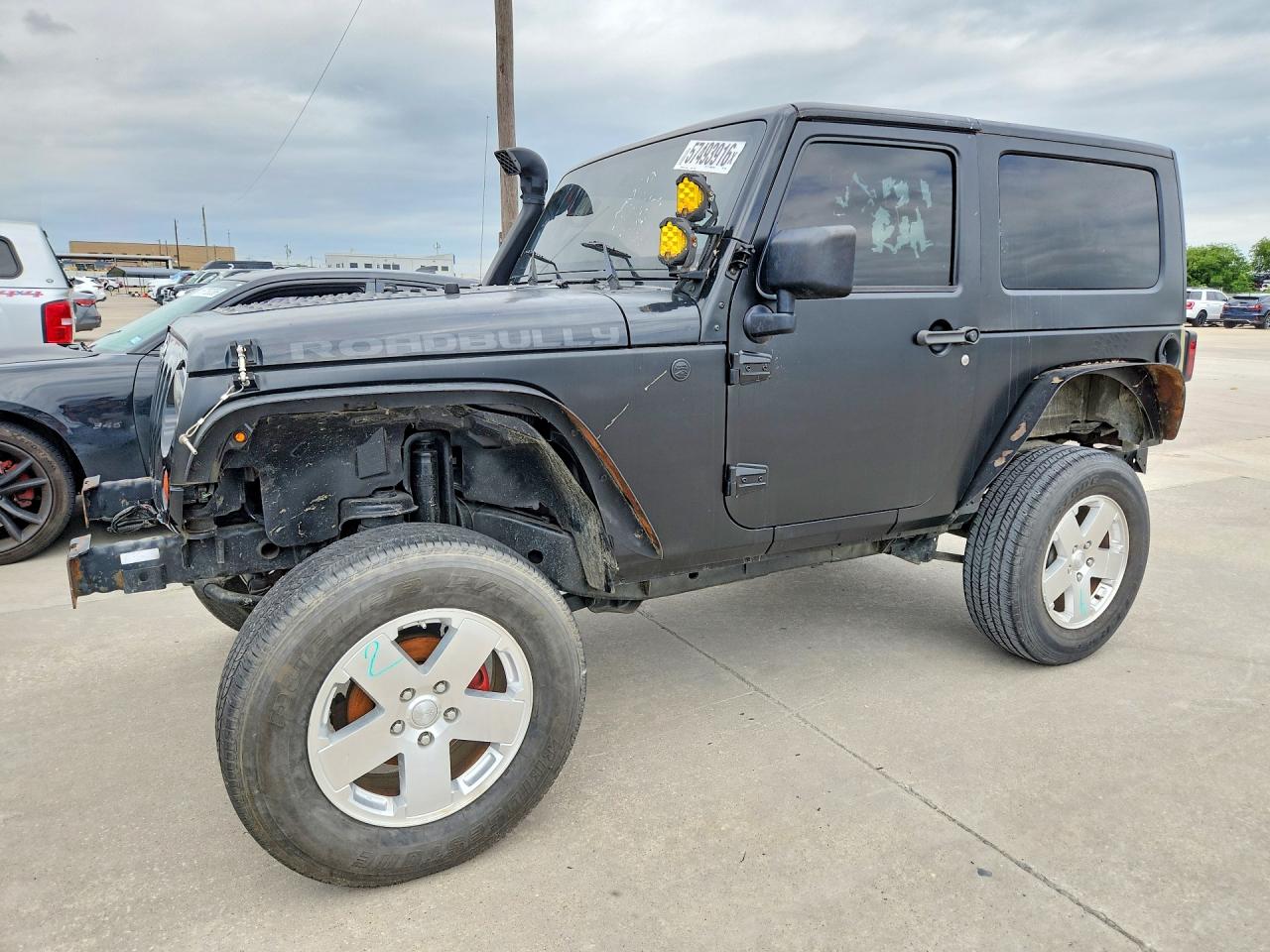 2010 Jeep Wrangler VIN 1J4AA2D14AL216900 COPART salvage auction — Normal Wear, TX - CERTIFICATE OF TITLE, sold $3,200 on 2026-07-03 (photo 1)
