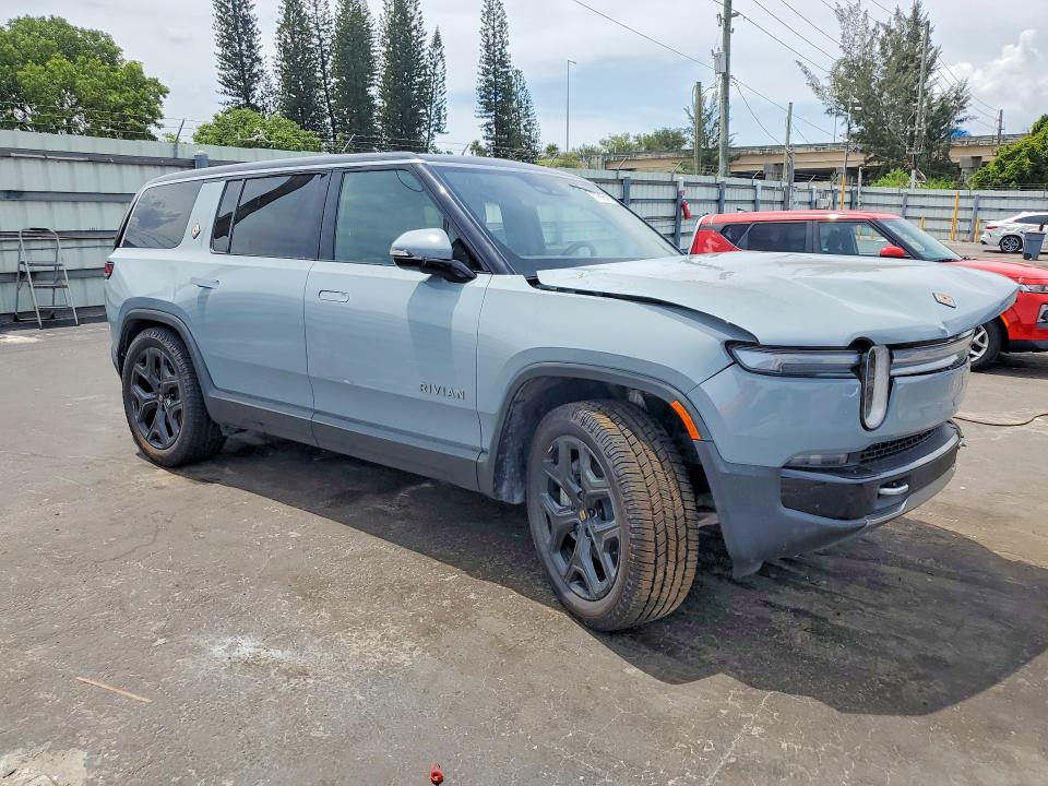 2025 Rivian R1s VIN 7PDSGBBA9SN054322 COPART salvage auction — SIDE, Ks - Cert Of Title-Salvage, sold $10,400 on 2026-07-20 (photo 4)