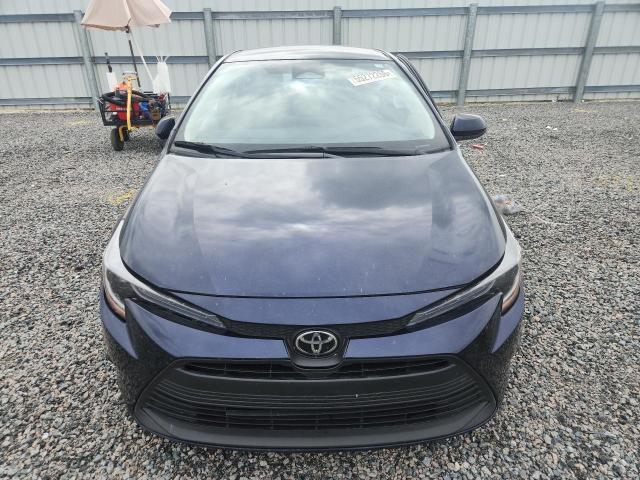 2025 Toyota VIN 5YFB4MDE3SP337975 COPART salvage auction — SIDE, Fl - Certificate Of Destruction, sold $5,200 on 2026-07-07 (photo 5)