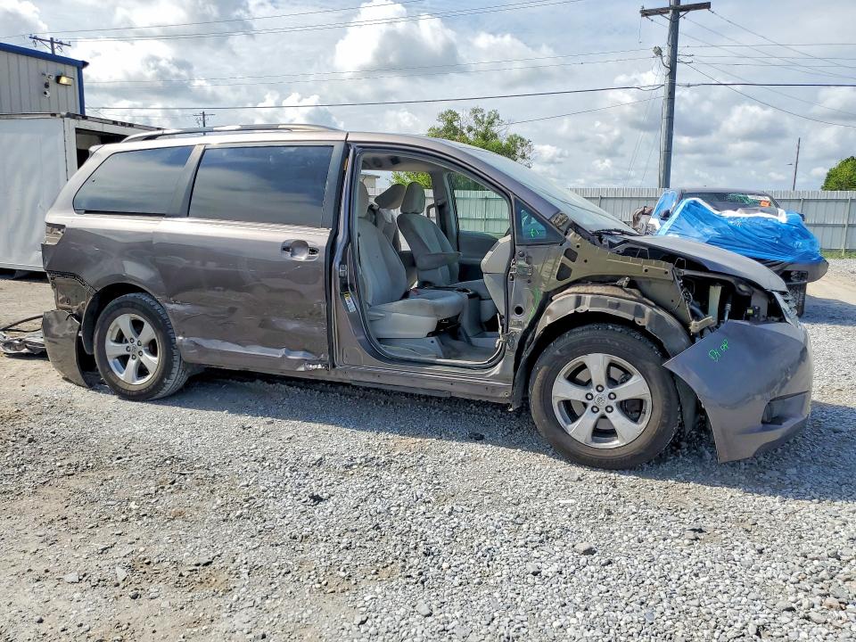 2014 Toyota Sienna VIN 5TDKK3DC7ES485511 COPART salvage auction — SIDE, FL - CERT OF TITLE SLVG REBUILDABLE, sold $1,450 on 2026-07-10 (photo 4)