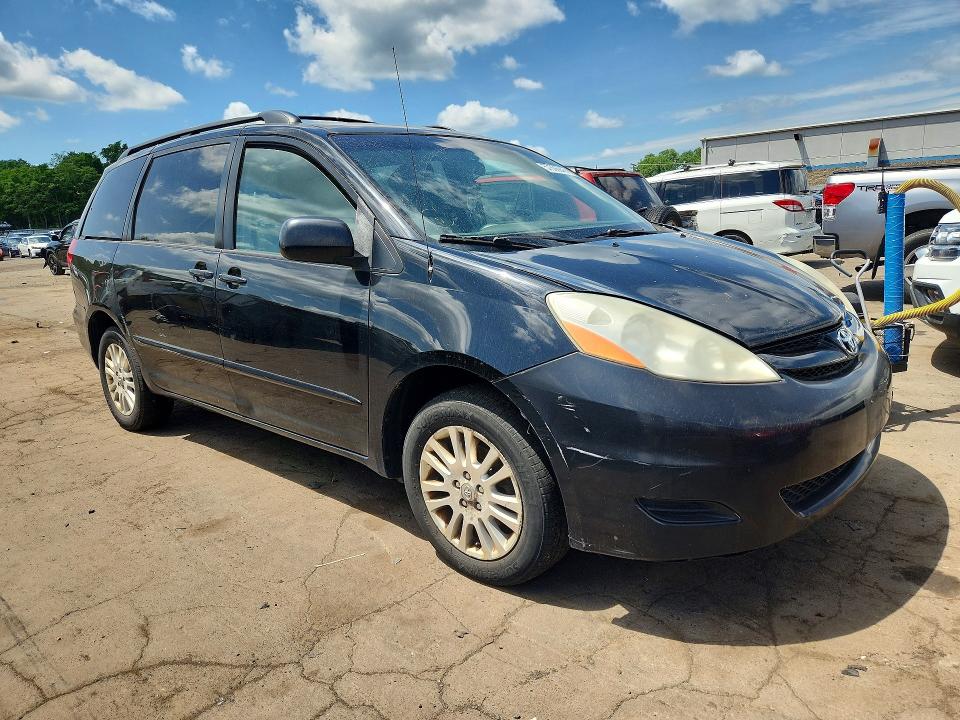 2009 Toyota Sienna VIN 5TDBK23C39S027529 COPART salvage auction — SIDE, MA - CERT OF TITLE-SALVAGE, sold $1,050 on 2026-07-14 (photo 4)