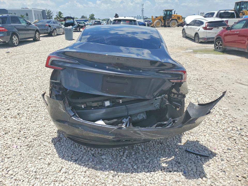 2025 Tesla Model 3 VIN 5YJ3E1EA4SF902306 COPART salvage auction — REAR END, Fl - Cert Of Title Slvg Rebuildable, sold $12,000 on 2026-08-18 (photo 6)