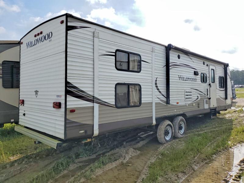 2014 Foresriver VIN 4X4TWDG24EA250962 COPART salvage auction — VANDALISM, TX - SALVAGE TITLE-FLOOD DAMAGE, sold $5,600 on 2026-07-17 (photo 4)