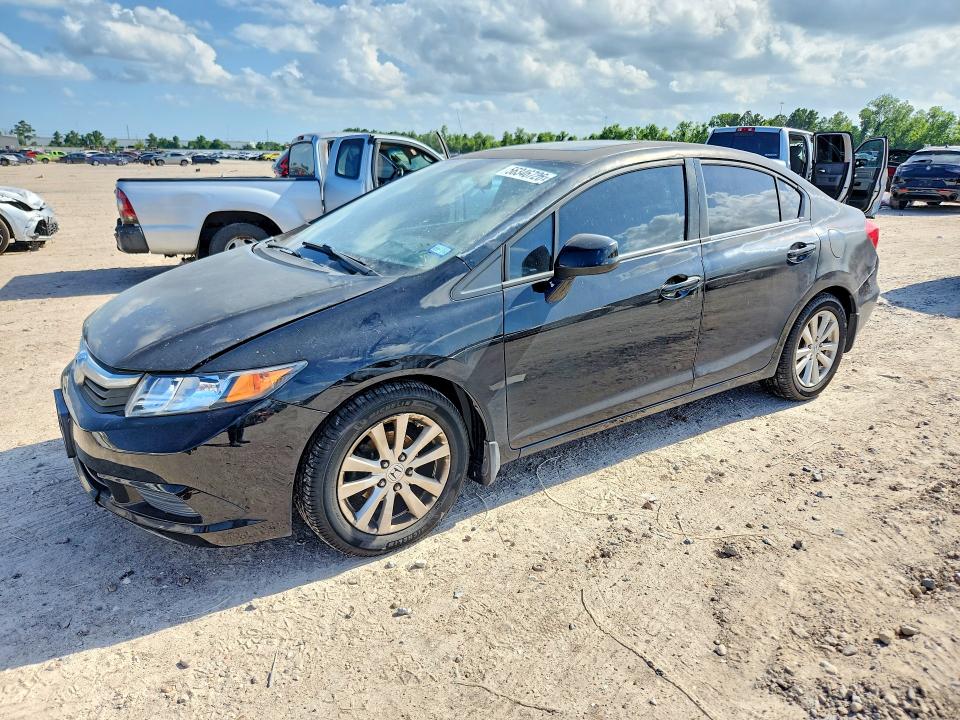2012 Honda Civic VIN 2HGFB2F95CH540452 COPART salvage auction — WATER/FLOOD, Tx - Salvage Title-Flood Damage, sold $625 on 2026-07-02 (photo 1)
