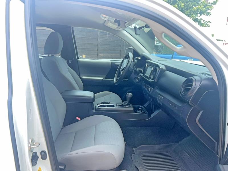 2017 Toyota Tacoma VIN 5TFRX5GN2HX098369 COPART salvage auction — MINOR DENT/SCRATCHES, Tx - Certificate Of Title (P), sold $7,600 on 2026-07-23 (photo 5)