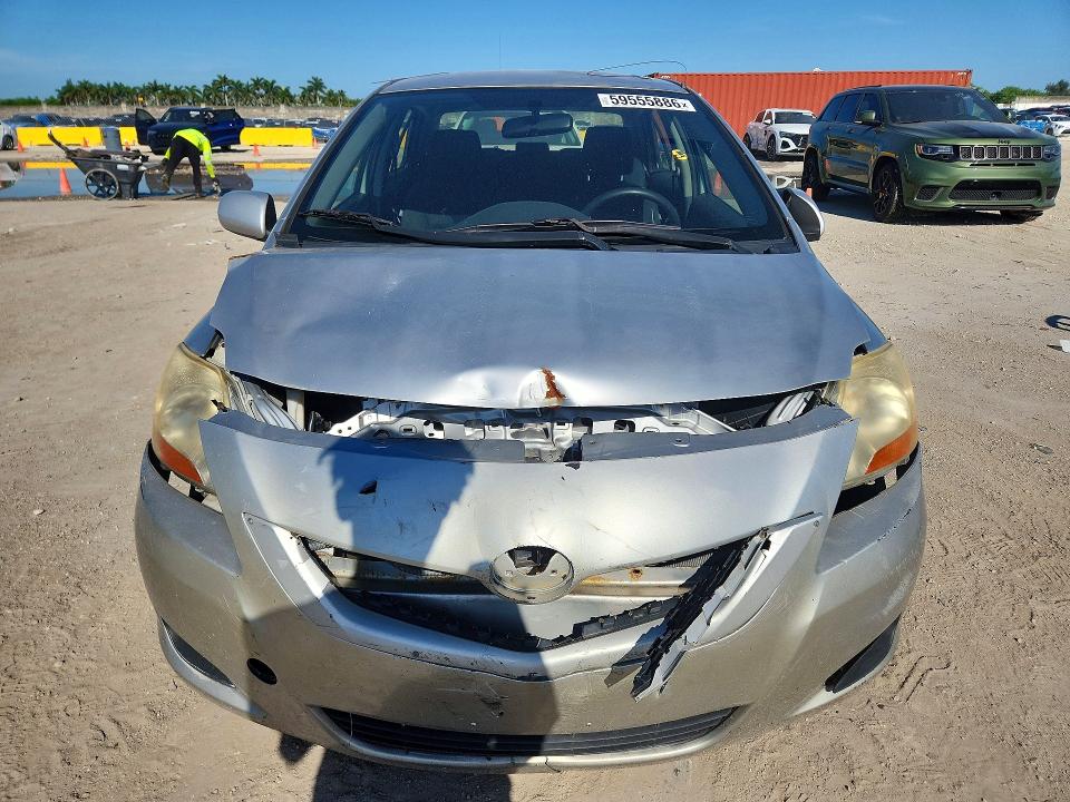 2011 Toyota Yaris VIN JTDBT4K37B1405476 COPART salvage auction — REAR END, Fl - Certificate Of Title, sold $1,500 on 2026-07-08 (photo 5)