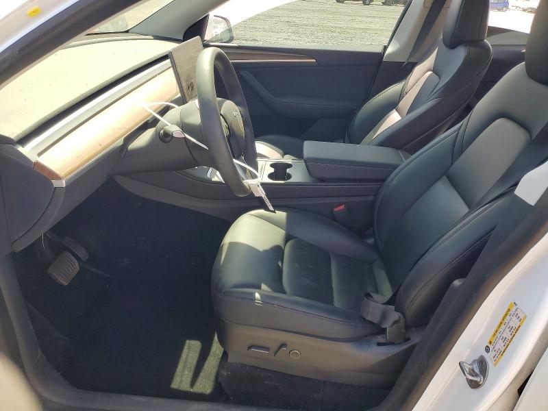 2023 Tesla Model y VIN 7SAYGDEE8PF690878 COPART salvage auction — REAR END, CA - SALVAGE CERTIFICATE, sold $10,700 on 2026-07-28 (photo 7)