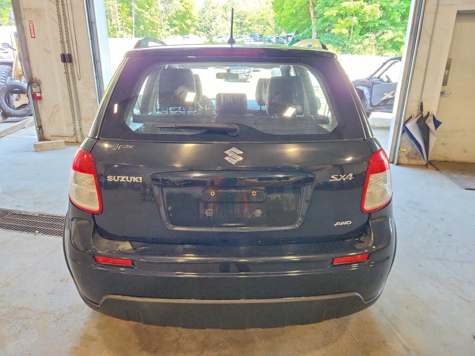 2011 Suzuki Sx4 VIN JS2YB5A38B6304170 COPART salvage auction — MINOR DENT/SCRATCHES, Vt - Certificate Of Title, sold $450 on 2026-07-06 (photo 6)
