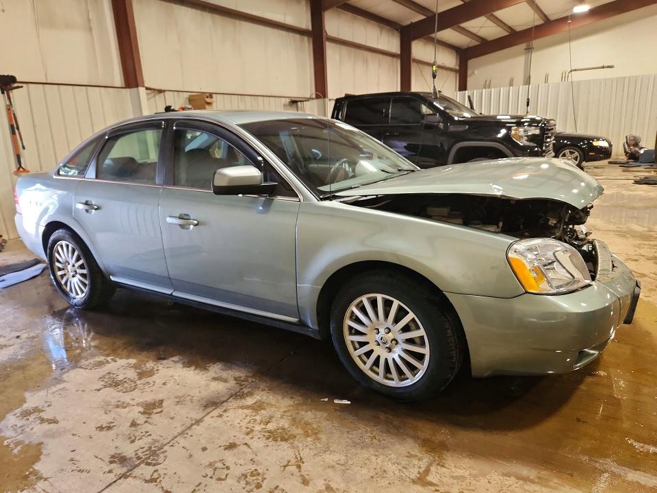 2007 Mercury Montego VIN 1MEHM43167G604526 COPART salvage auction — FRONT END, PA - CERT OF SALV-R=RECONSTRUCTED, sold $400 on 2026-07-10 (photo 4)
