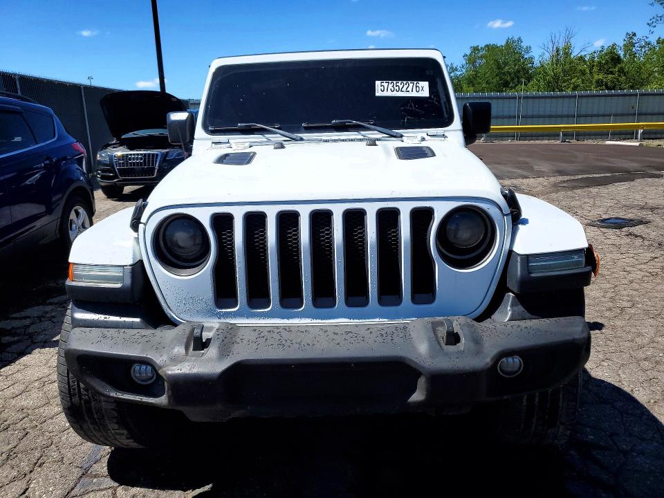 2018 Jeep Wrangler unlimited VIN 1C4HJXDG6JW110064 COPART salvage auction — MINOR DENT/SCRATCHES, MI - CERT OF TITLE-REBUILT SALVAGE, sold $11,700 on 2026-07-02 (photo 5)