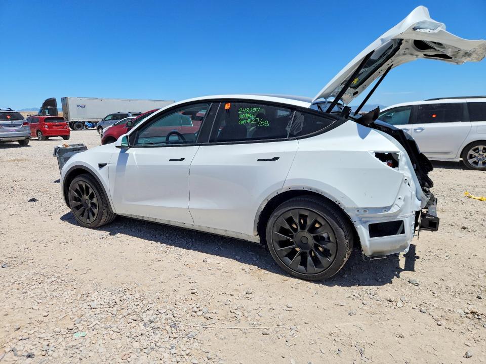 2025 Tesla Model y VIN 7SAYGDEEXSF248757 COPART salvage auction — REAR END, Ut - Salvage Certificate, sold $14,200 on 2026-07-31 (photo 2)