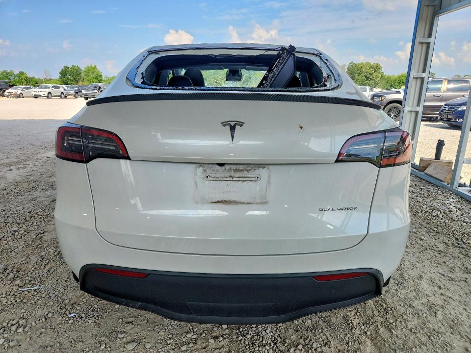2023 Tesla Model y VIN 7SAYGDEE3PA207780 COPART salvage auction — HAIL, MO - SALVAGE CERTIFICATE OF TITLE, sold $12,800 on 2026-07-27 (photo 6)