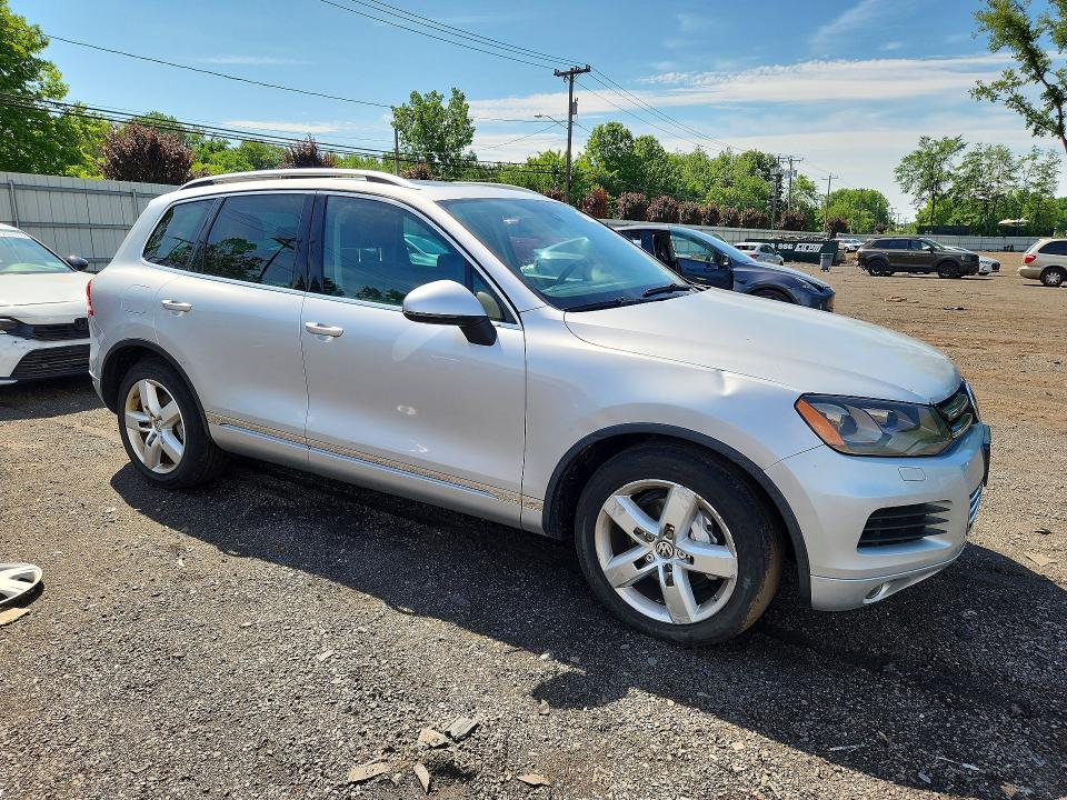 2012 Volkswagen VIN WVGEF9BP3CD010632 COPART salvage auction — SIDE, Ny - Mv-907A Salvage Certificate, sold $475 on 2026-07-14 (photo 4)