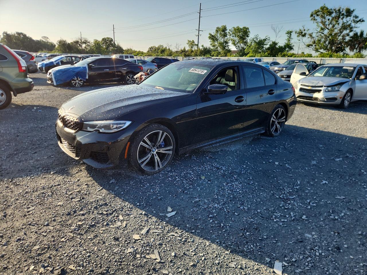 2021 BMW M340i VIN 3MW5U9J07M8B65498 — COPART salvage auction photo