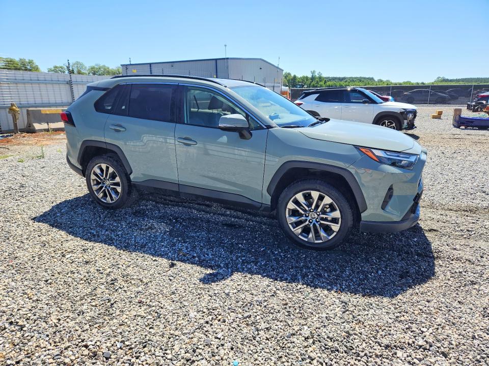 2023 Toyota Rav 4 VIN JTMC1RFV9PD100697 COPART salvage auction — SIDE, Nc - Salvage Certificate Of Title, sold $375 on 2026-07-22 (photo 4)