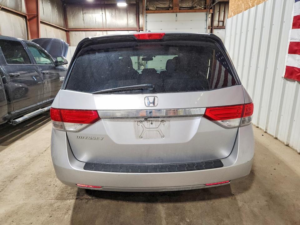 2014 Honda Odyssey VIN 5FNRL5H64EB080237 COPART salvage auction — FRONT END, AK - CERT OF VEH TITLE-RECONSTRUCTE, sold $750 on 2026-07-21 (photo 6)