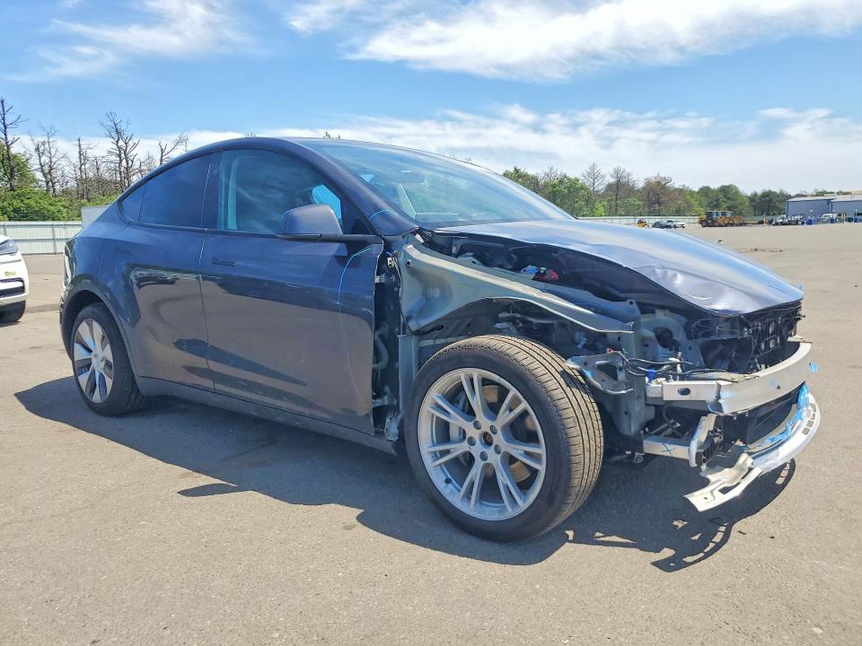 2024 Tesla Model y VIN 7SAYGDEE9RA253620 COPART salvage auction — FRONT END, NY - MV907A W/UNSATISFIED LIEN, sold $13,800 on 2026-07-13 (photo 4)