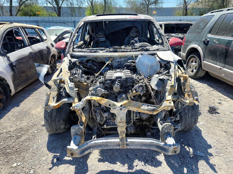 2014 Porsche Cayenne VIN WP1AE2A26ELA50830 COPART salvage auction — Burn Interior, NV - NON-REPAIRABLE VEHICLE CERT, sold $200 on 2026-08-11 (photo 5)