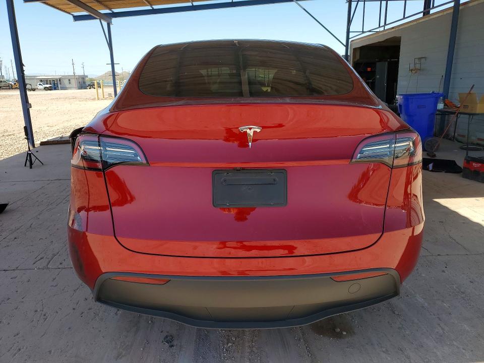 2025 Tesla Model y VIN 7SAYGDED0SF280026 COPART salvage auction — SIDE, Az - Cert Of Title - Salvage, sold $6,100 on 2026-07-28 (photo 6)