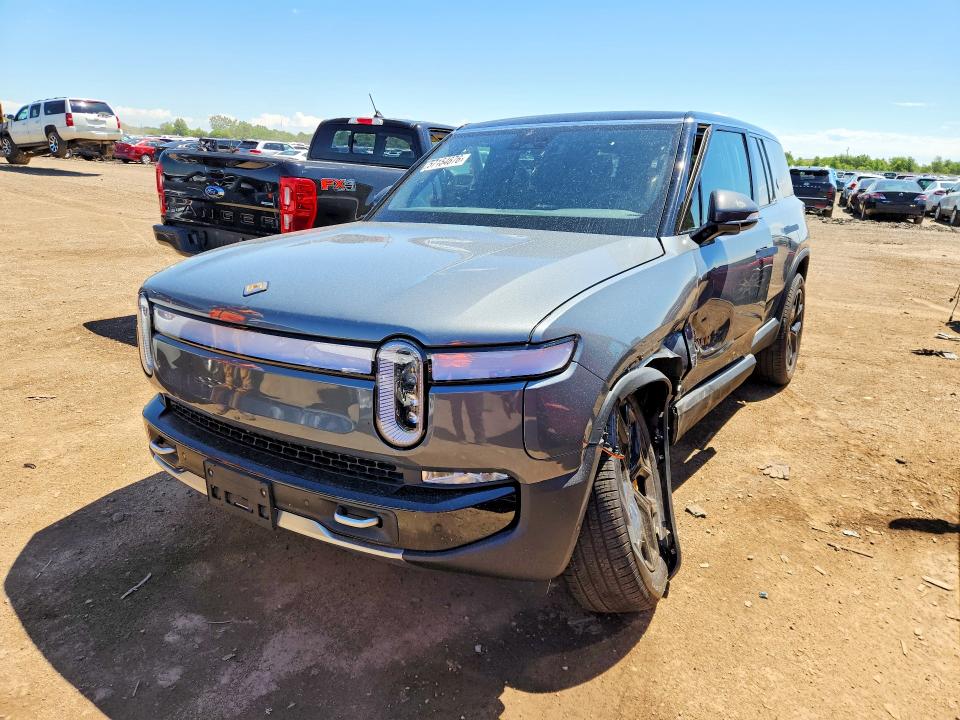 2023 Rivian VIN 7PDSGABA1PN023602 COPART salvage auction — FRONT END, Il - Salvage Certificate, sold $20,000 on 2026-07-13 (photo 1)